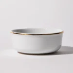 Founder’s Edition porcelain shaving bowl with 24K gold trim, celebrating pure form and understated craftsmanship
