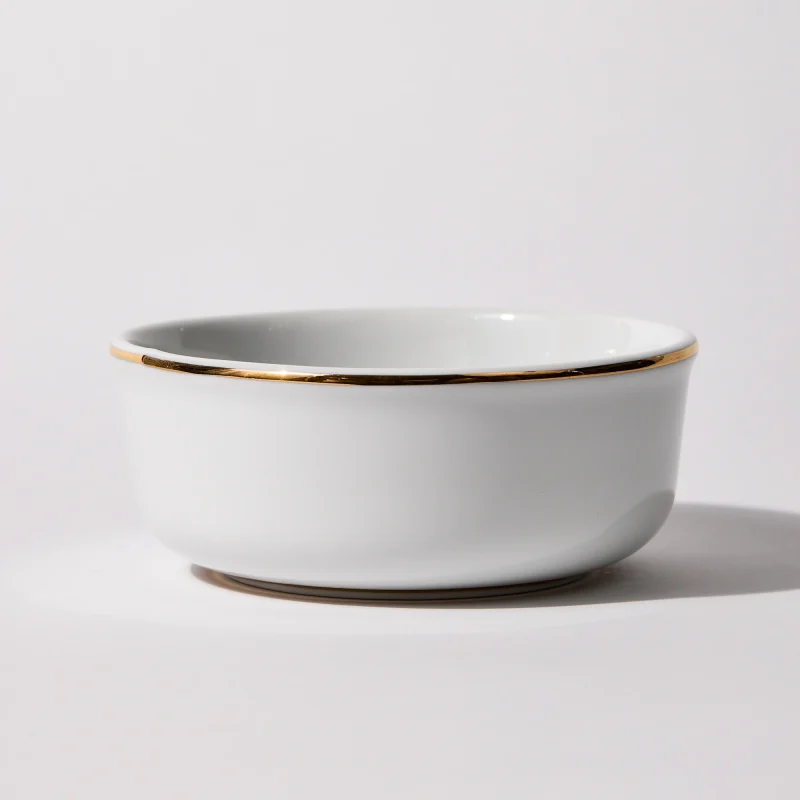 Founder’s Edition porcelain shaving bowl with 24K gold trim, celebrating pure form and understated craftsmanship
