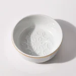 Top-down view of shaving bowl interior showing lather feature and smooth glazed surface