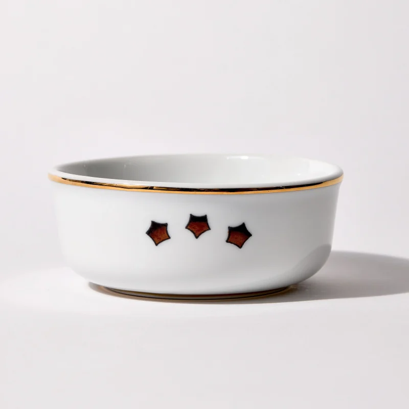 Back of shaving bowl with illustration of vintage stylized American flag stars